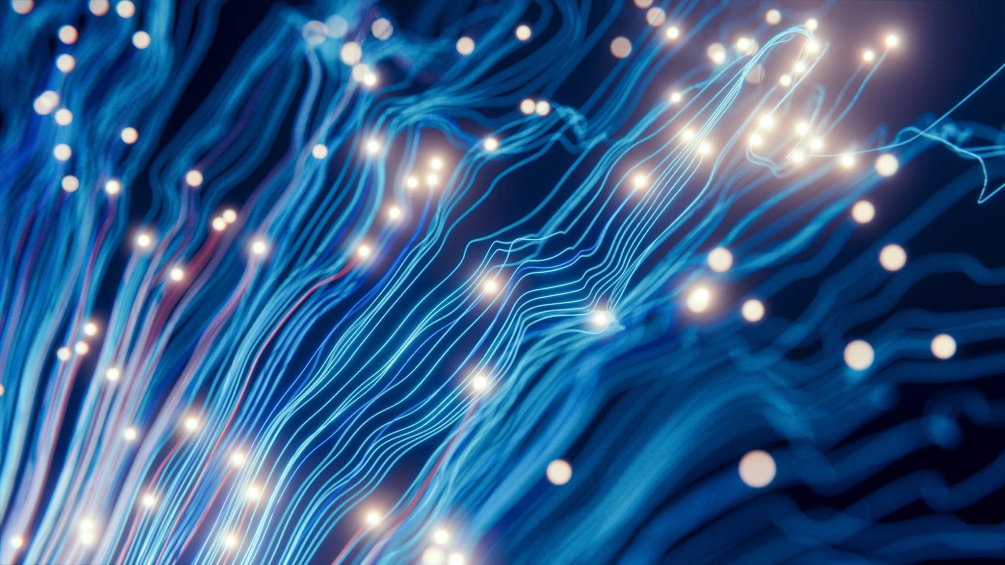 Image of interconnecting blue wires with yellow dots by Luke Jones